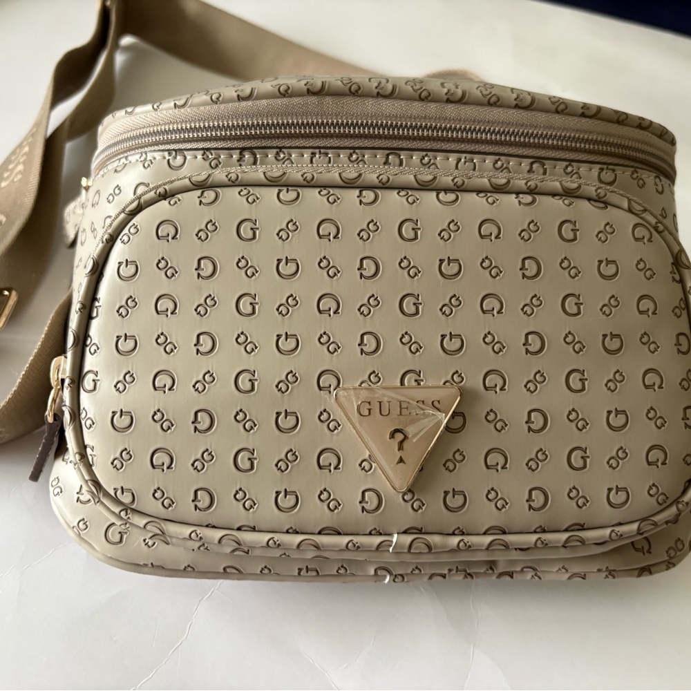 Guess Beige Logo-Print Crossbody Bag with Gold Triangle Plaque